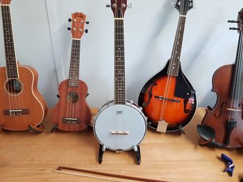 High angle view of guitar on table