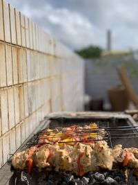 Close-up of meat on barbecue grill