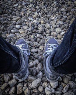 Low section of people on rocks