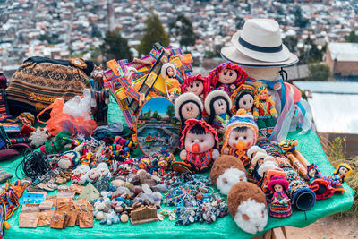 Multi colored toys for sale at market stall