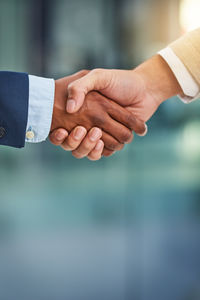 Close-up of business people shaking hands