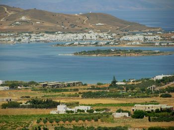 Scenic view of sea with mountain in background