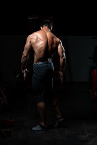 Low section of man exercising in gym