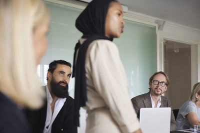 Businessmen sitting at meeting