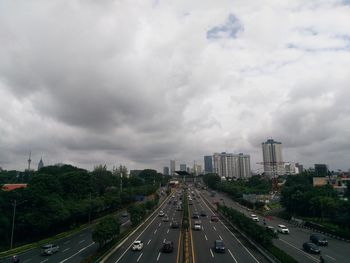 High angle view of highway in city against sky