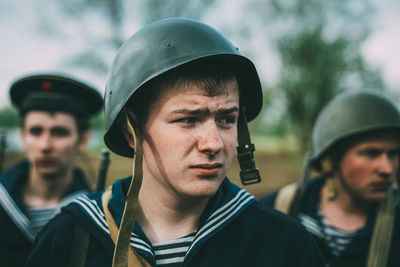 Portrait of young man looking away