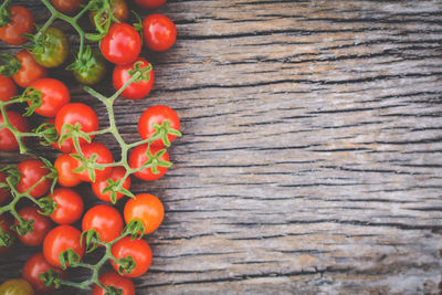 Close-up of tomatoes on wood