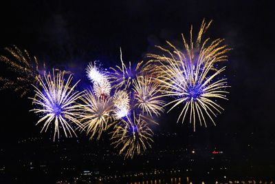 Firework display at night