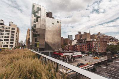 Buildings in city against sky