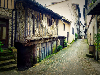 Narrow alley amidst old buildings