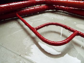 High angle view of water drops on metal