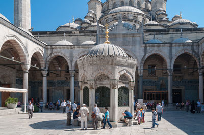 Group of people in front of building