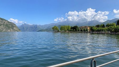 Scenic view of lake against blue sky