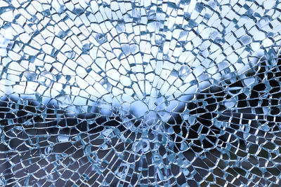 Full frame shot of broken glass window