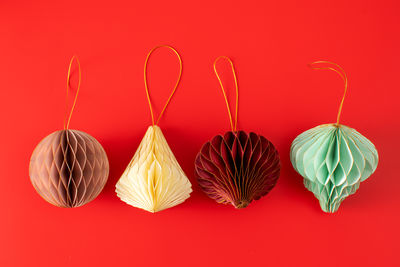 Directly above shot of christmas decorations against yellow background