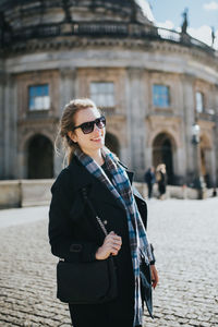 Young woman wearing sunglasses