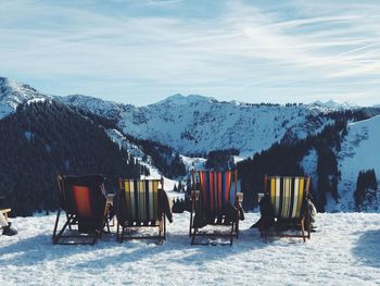 Scenic view of snowcapped mountains against sky