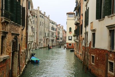 View of canal along buildings