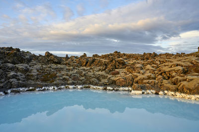 Geothermal spring in cloudy day