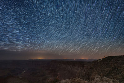 Scenic view of sea against sky at night