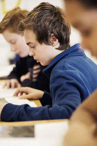 High school students studying in classroom