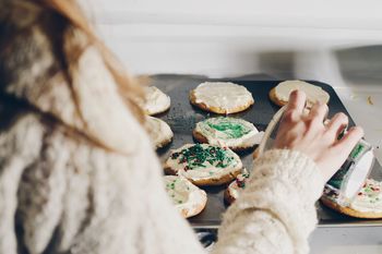 Close-up of woman preparing food at home