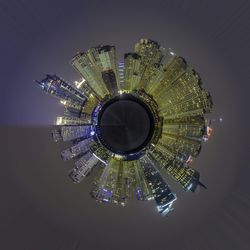 Low angle view of illuminated lights at night