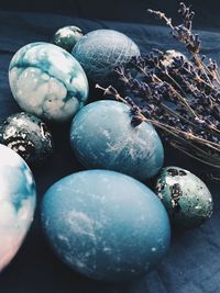High angle view of shells on pebbles