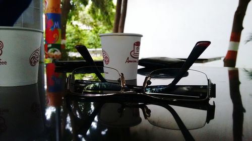 Close-up of telephone on table at home