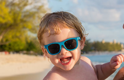 Portrait of smiling boy wearing sunglasses