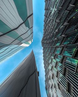 Low angle view of skyscrapers against sky