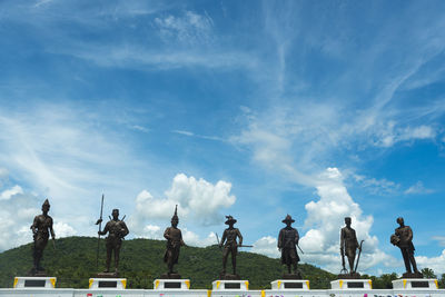 Panoramic shot of statues against sky