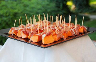 Melon and parma ham served during a banquet