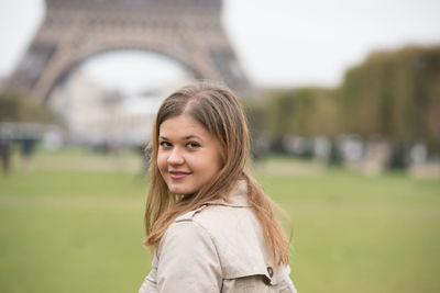 Portrait of woman on field