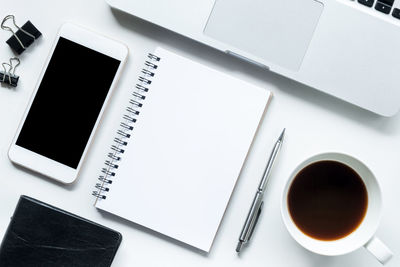 High angle view of coffee cup on table