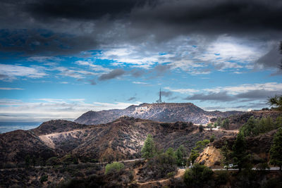 View of landscape against cloudy sky