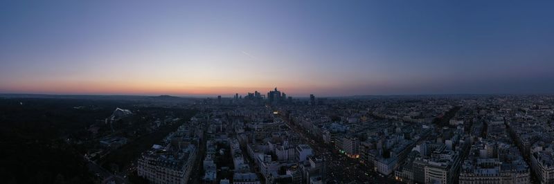 High angle view of city buildings during sunset