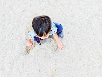 High angle view of woman on beach