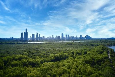 Panoramic shot of city buildings against sky