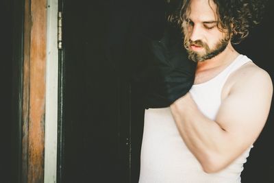 Midsection of man standing on floor