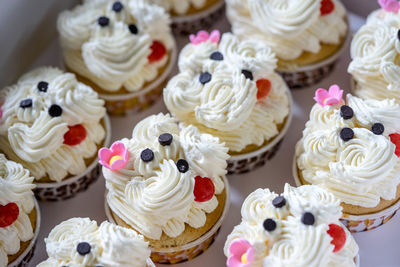 High angle view of cupcakes on cake