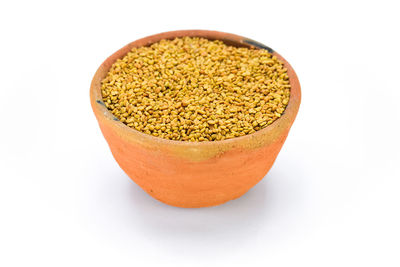 High angle view of bread in bowl against white background