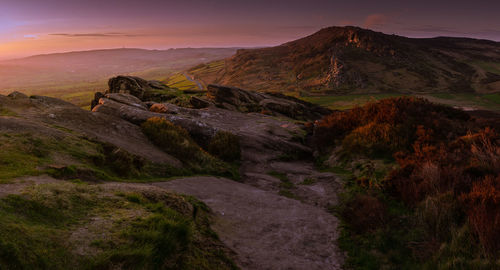 Scenic view of landscape against sky during sunset