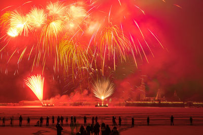 Firework display at night