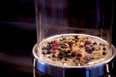 Close-up of glass of jar on table