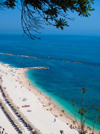 Scenic view of sea against blue sky