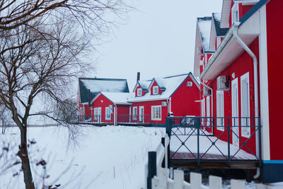 House on snow covered landscape