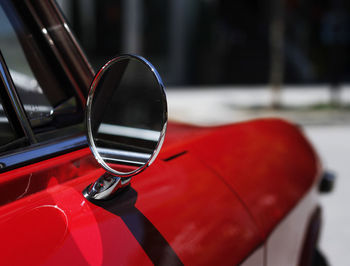 Close-up of red wine on glass table