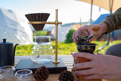 Man brewing coffee in morning