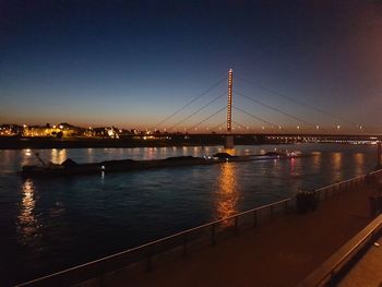 View of suspension bridge at night